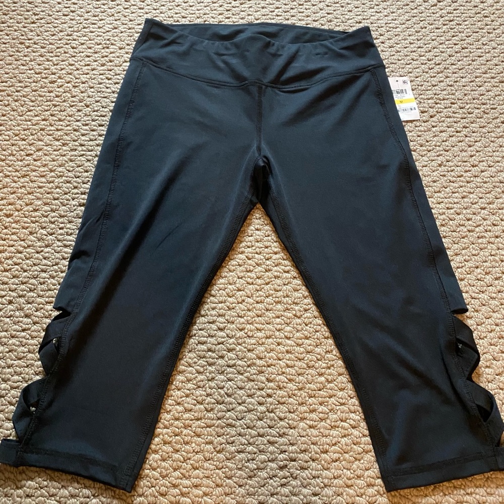black capri leggings with cut out detail